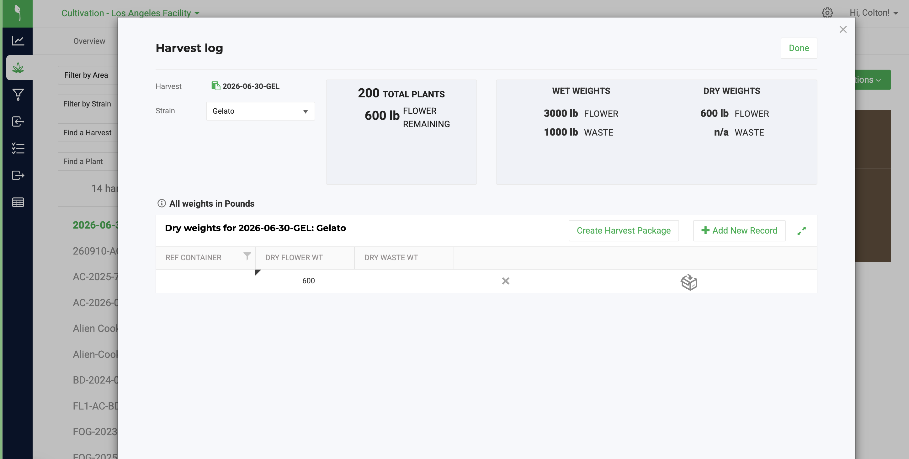 Flourish Software Harvest log modal showing plant totals, wet weights, and dry weights for a harvest batch.