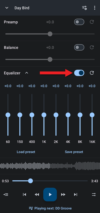 Equalizer with an arrow pointing at its on/off switch