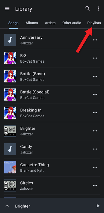 Library with an arrow pointing at the Playlists tab