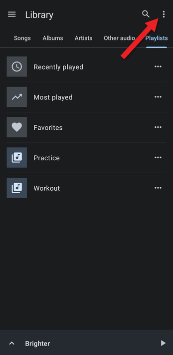 Playlists tab with an arrow pointing at the menu button