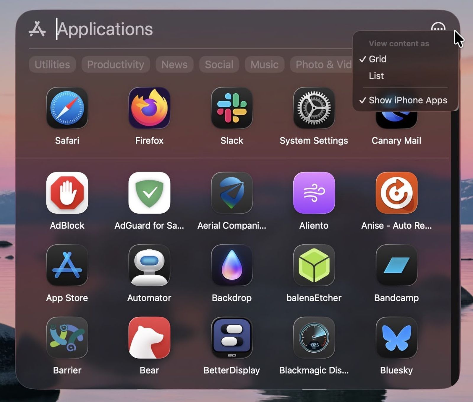 Screenshot of the new Apps view replacing Launchpad with Grid and List options