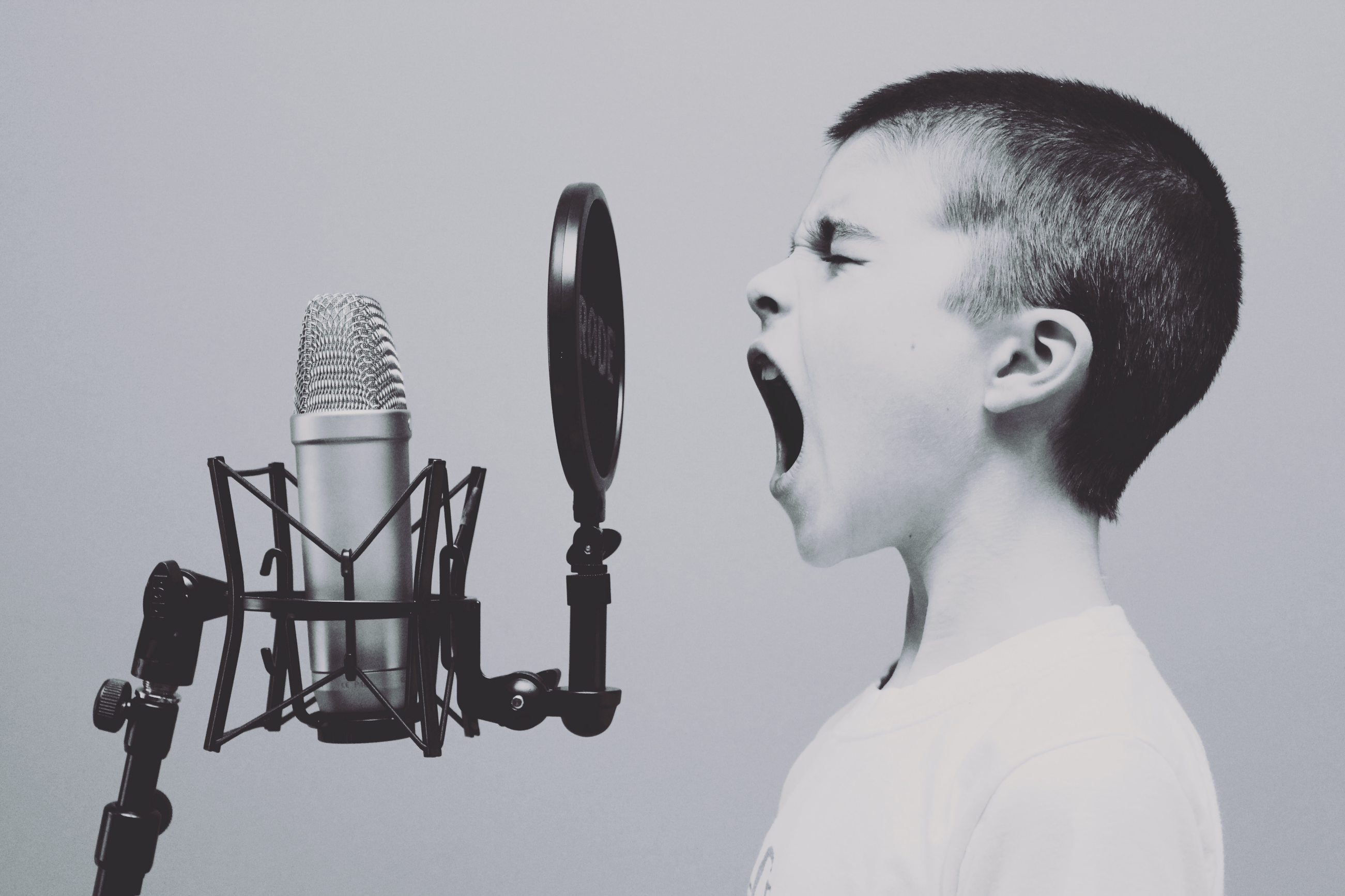 man using noise canceling microphone