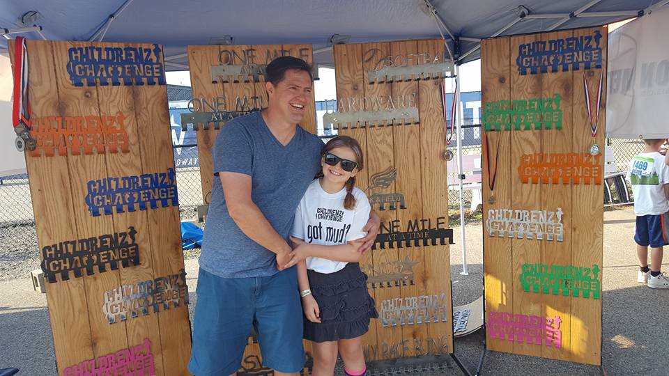 Owner Alan Russell and his daughter at a trade show.